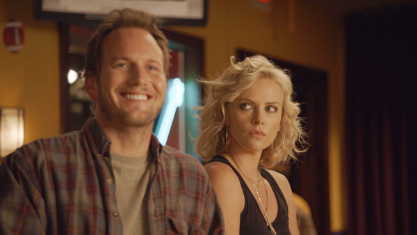 Left to right: Patrick Wilson plays Buddy Slade and Charlize Theron plays Mavis Gary in YOUNG ADULT, from Paramount Pictures and Mandate Pictures.