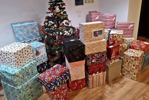 De Crăciun, programul „Bucurie la cutie” a ajuns la copiii din București și din 23 de județe ale țării