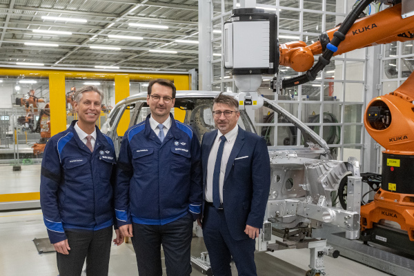 BMW Group Plant Dingolfings Director Christoph Schroder, Member of the Board of Management of BMW AG, Production, Dr. Milan Nedeljkovic, and Head of the Works Council of BMW Group Plant Dingolfing, Stefan Schmid, are visiting the construction of the BMW iNEXT body shop