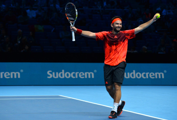 Romania's Florin Mergea celebrates after beating Brazil's Marcelo Melo and Croatia's Ivan Dodig in a men's doubles semi-final match on day seven of the ATP World Tour Finals tennis tournament in London on November 21, 2015. AFP PHOTO / GLYN KIRK (Photo credit should read GLYN KIRK/AFP via Getty Images)